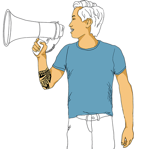 A man holding a megaphone in his hand.