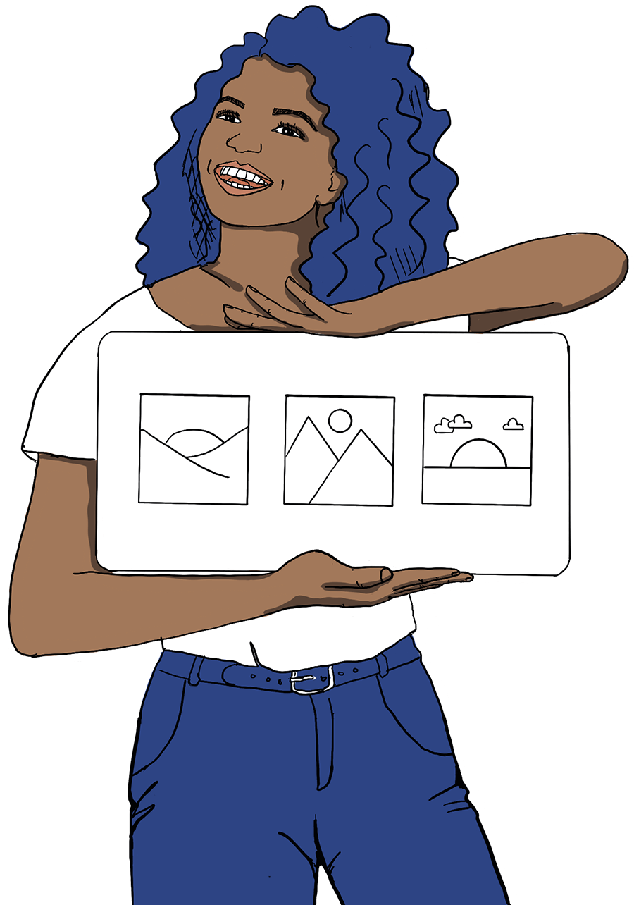 A woman holding a picture in her hands.