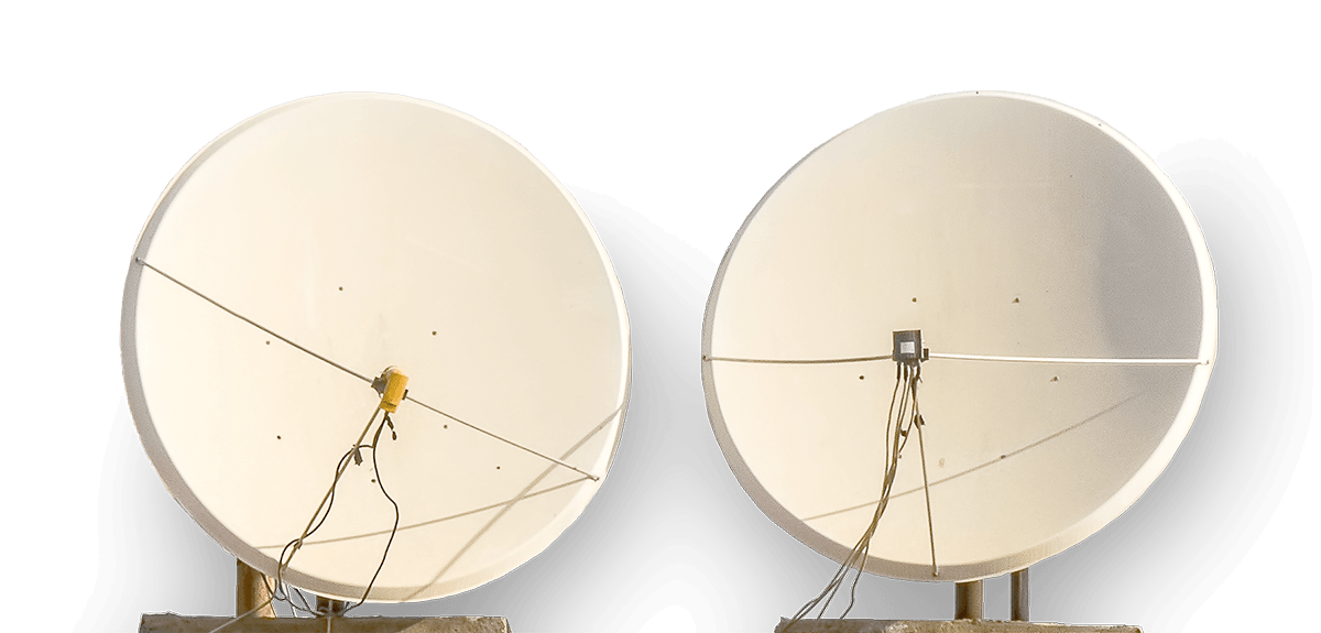 Two satellite dishes standing side by side.