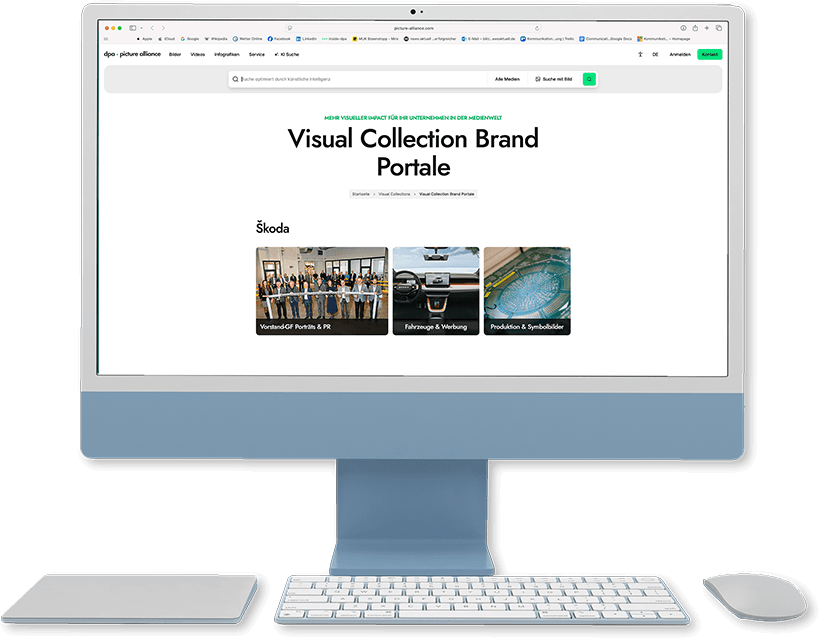 A computer displaying the Visual Collections website on its screen.