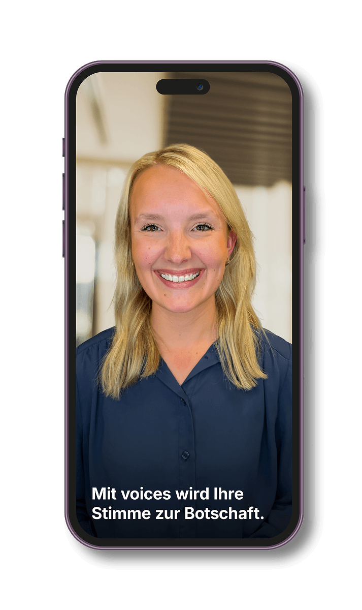 A smartphone with a picture of a woman smiling at the camera.
