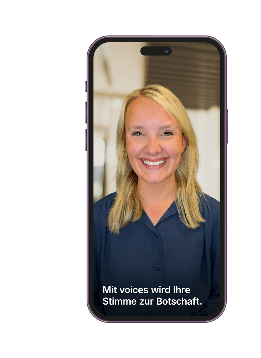 A smartphone with a picture of a woman smiling at the camera.